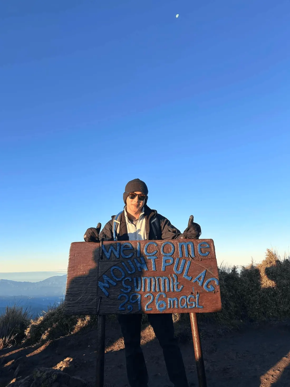 Anthony at the summit of Mount Pulag